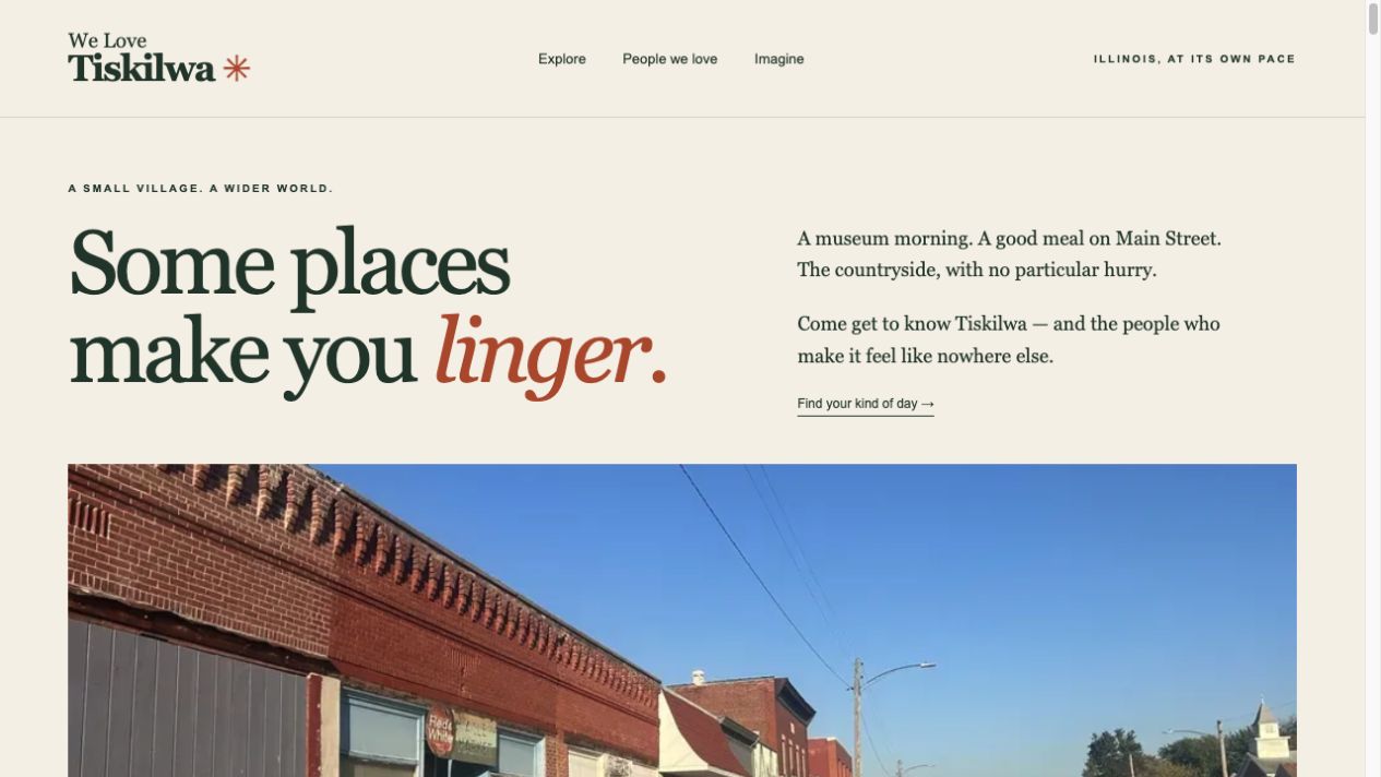 We Love Tiskilwa homepage with expressive serif typography and a photograph of Main Street